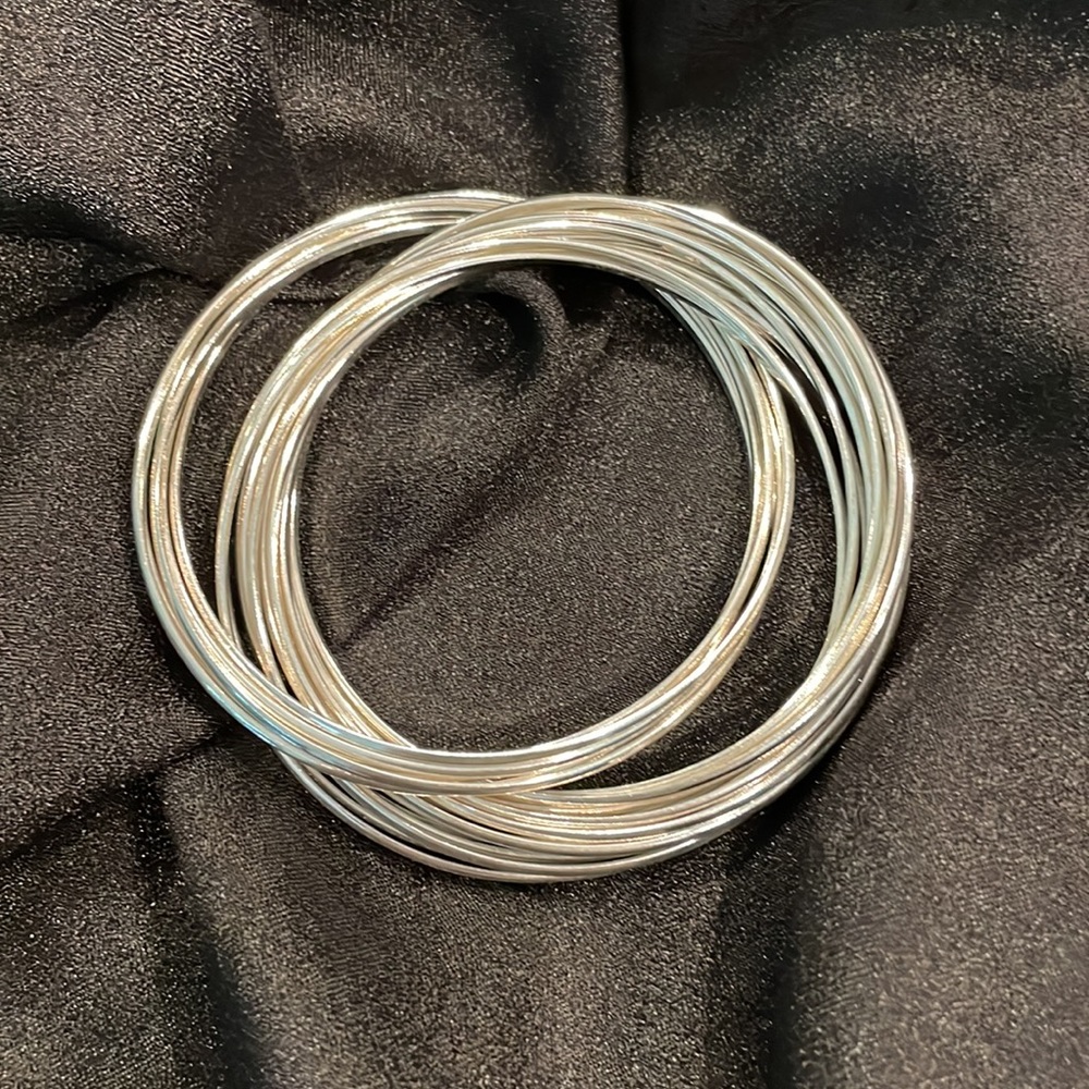 21 Sterling Silver Interlocking Bracelets. New in box.